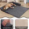 A dog is sleeping on a dark gray pet bed with raised edges, placed on a wooden floor. Below the main image are two close-up shots highlighting the bed's features. Náhled obrázku produktu