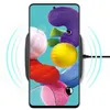 A smartphone is placed on a wireless charging pad, with charging waves emanating from the pad. Produktbild-Vorschau