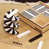 Set di tavole in legno Kapla 100 pezzi in bianco e nero Anteprima dell’immagine prodotto 3