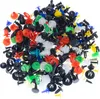 A pile of assorted automotive clips and fasteners. Podgląd zdjęcia produktu
