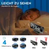A person sleeping in bed with a projection alarm clock on the nightstand, and a collage of different display modes of the alarm clock below. Produktbild-Vorschau