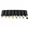 A set of eight different laptop power adapter tips arranged in a black holder against a white background. Produktbild-Vorschau