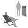A diagram showing the dimensions of a folding lounge chair with a person sitting in it and a standing silhouette for scale. Voir les images du produit