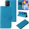 Collage of images showing a blue floral and butterfly patterned flip phone case for a Xiaomi Redmi Note 11 Pro. Produktbild-Vorschau