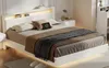 A modern bedroom with a white bed, nightstand, and desk. Produktbild-Vorschau