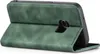 A green flip cover case for a Samsung Galaxy S7 edge phone is shown from the back, with the case open. Produktbild-Vorschau