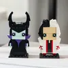 Two LEGO BrickHeadz figures, Maleficent and Cruella, are displayed side-by-side on a surface. Anteprima dell’immagine prodotto