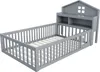 A grey wooden children's bed with a house-shaped headboard and built-in shelving. Podgląd zdjęcia produktu