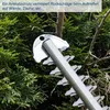 Close-up of a hedge trimmer blade cutting through branches and leaves. Anteprima dell’immagine prodotto