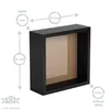 A black shadow box frame with measurement annotations. Produktbild-Vorschau