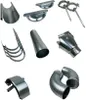 A collection of various gutter and downspout components made of metal, arranged on a white background. Produktbild-Vorschau