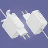 Two white power adapters are shown against a light purple background. Produktbild-Vorschau
