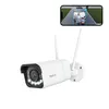 A white Reolink security camera with two antennas is shown in the foreground, with a smartphone displaying a live feed from the camera in the background. Anteprima dell’immagine prodotto