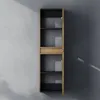 A tall, narrow cabinet with open shelves and a drawer against a textured wall with dramatic lighting. Anteprima dell’immagine prodotto