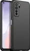 A black silicone phone case is shown next to a smartphone. Podgląd zdjęcia produktu