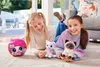 Two young girls are lying on the floor with stuffed kittens. Podgląd zdjęcia produktu