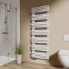 A white towel radiator is shown in a modern bathroom setting next to a shower and toilet. Náhled obrázku produktu
