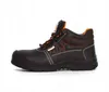 A black work boot with orange accents is shown against a white background. Produktbild-Vorschau