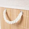 Close-up of a woven bamboo laundry basket with a rope handle. Náhled obrázku produktu