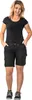 A woman is standing and posing for a product photo, wearing black shorts and a black t-shirt. Produktbild-Vorschau