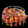A metal rack holding multiple skewers of meat and vegetables, presented against a black background. Náhľad obrázku produktu