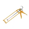 A yellow and silver caulking gun is shown against a white background. Produktbild-Vorschau