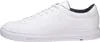 A side view of a white leather sneaker. Voir les images du produit
