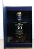 A bottle of Centenario Rum 30 Anos Edicion Limitada is presented in its blue gift box. Produktbild-Vorschau