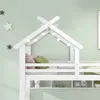 A close-up view of a white wooden house-shaped loft bed with decorative lights and pillows. Náhled obrázku produktu