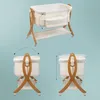 A collage of three images showing a baby bassinet from different angles and demonstrating its features. Náhled obrázku produktu