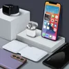 A collection of electronic devices including a smartphone, wireless earbuds, a smartwatch, and a wireless charger, arranged on white pedestals against a gray background. Produktbild-Vorschau