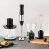 An immersion blender set with attachments and ingredients. Produktbild-Vorschau