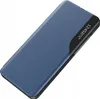 A blue flip case for a Samsung S24 Ultra phone, shown from a diagonal top-down perspective on a white background. The case has a transparent window on the front cover, displaying the time and date. Náhľad obrázku produktu