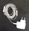 A white power adapter and a tangled white cord with a small white connector are laid out on a black surface. Produktbild-Vorschau