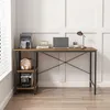 A desk with a laptop, radio, lamp, and books. Podgląd zdjęcia produktu