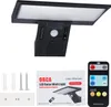 A product shot of a solar wall light with its accessories and remote control, laid out on a white background. Produktbild-Vorschau