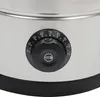 Close-up of a temperature control dial on a silver appliance. Podgląd zdjęcia produktu