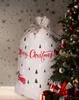 A large, decorated Christmas sack is placed next to a decorated Christmas tree, with gifts at the base of the tree. Podgląd zdjęcia produktu