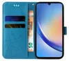 A blue flip phone case with floral and butterfly embossing, showing slots for cards and a banknote. A smartphone is placed inside the case. Produktbild-Vorschau