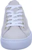 A close-up, front-facing view of a beige sneaker with white laces. Produktbild-Vorschau
