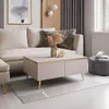 A modern living room setting with a beige couch and a coffee table. Produktbild-Vorschau