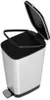A silver and black pedal trash can with its lid open. Voir les images du produit