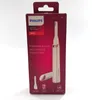 The image shows the retail packaging of a Philips eyebrow pen trimmer. Náhled obrázku produktu