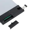 The underside of a portable wireless keyboard is shown, with the battery compartment open and a USB receiver nearby. Voir les images du produit