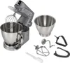 A kitchen stand mixer with various attachments, laid out on a white background. Voir les images du produit