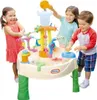 Three children are playing with a water table outdoors. Náhľad obrázku produktu