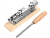 A retro nutcracker with a lever function, made of stainless steel, is displayed on a white background. A wooden handle is attached to a metal rod, which is part of the nutcracker mechanism. Náhled obrázku produktu