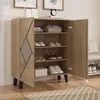 A modern shoe cabinet with doors open, displaying shoes and storage boxes on shelves. The cabinet is made of wood-look material and has a decorative diamond pattern on the door. Anteprima dell’immagine prodotto