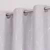 A close-up view of light gray curtains with silver wavy lines and dots, hanging from a curtain rod. Produktbild-Vorschau