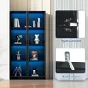 A product image showcasing a black glass display cabinet with blue LED lighting, featuring close-ups of its hydraulic hinges and wall mounting hardware. Produktbild-Vorschau